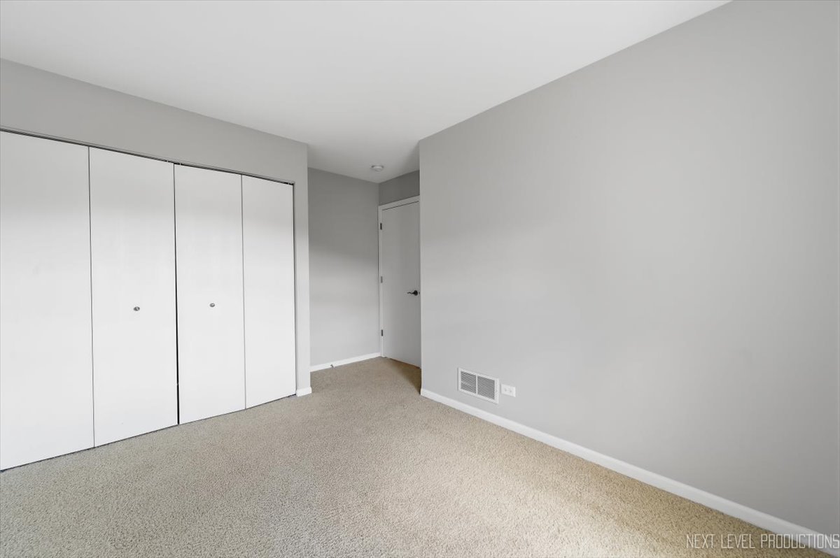 1102 Delta Drive, Unit 1102 Elgin, IL 60123 - Photo 25 of 29 a view of an empty room