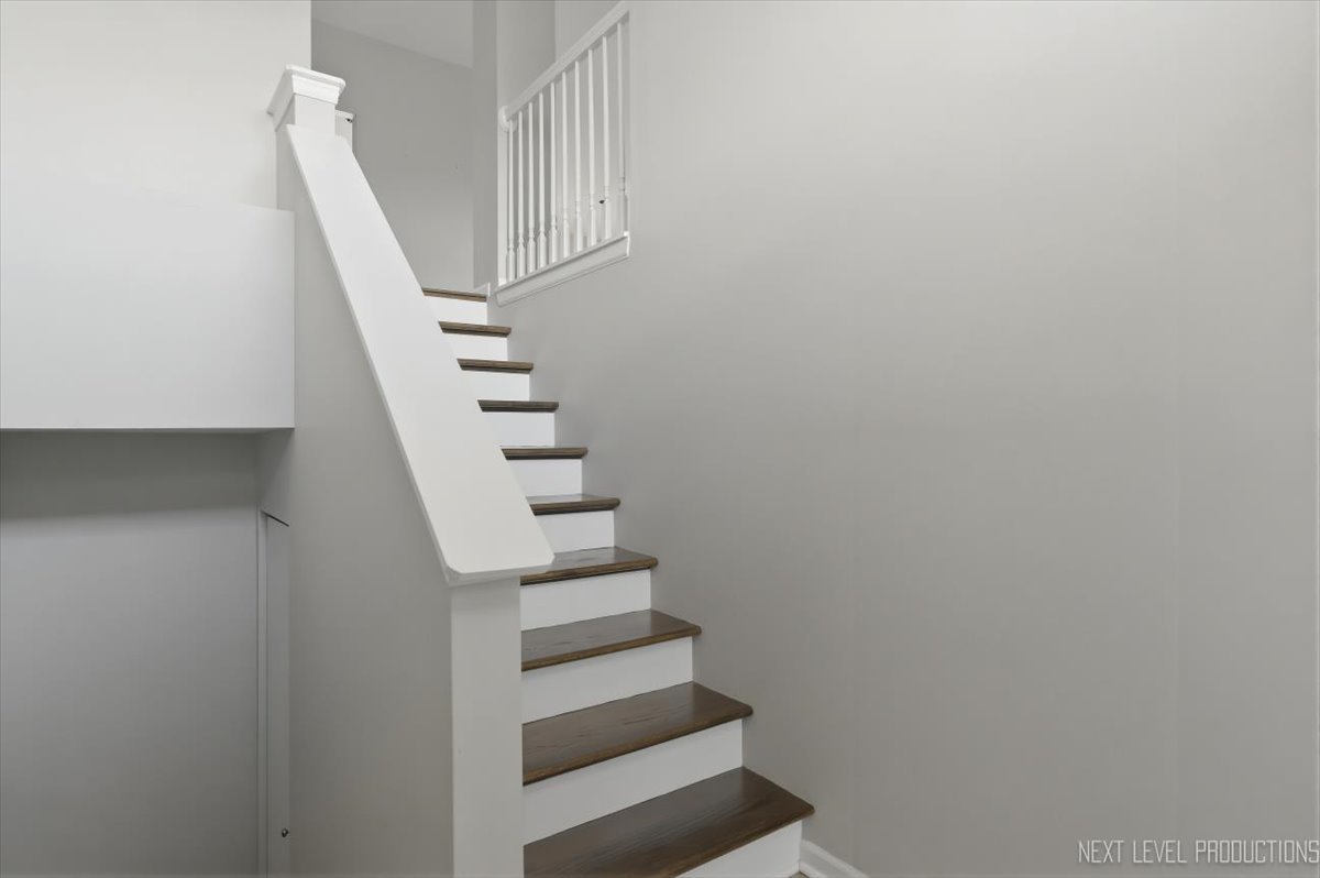 1102 Delta Drive, Unit 1102 Elgin, IL 60123 - Photo 3 of 29 a view of entryway with stairs