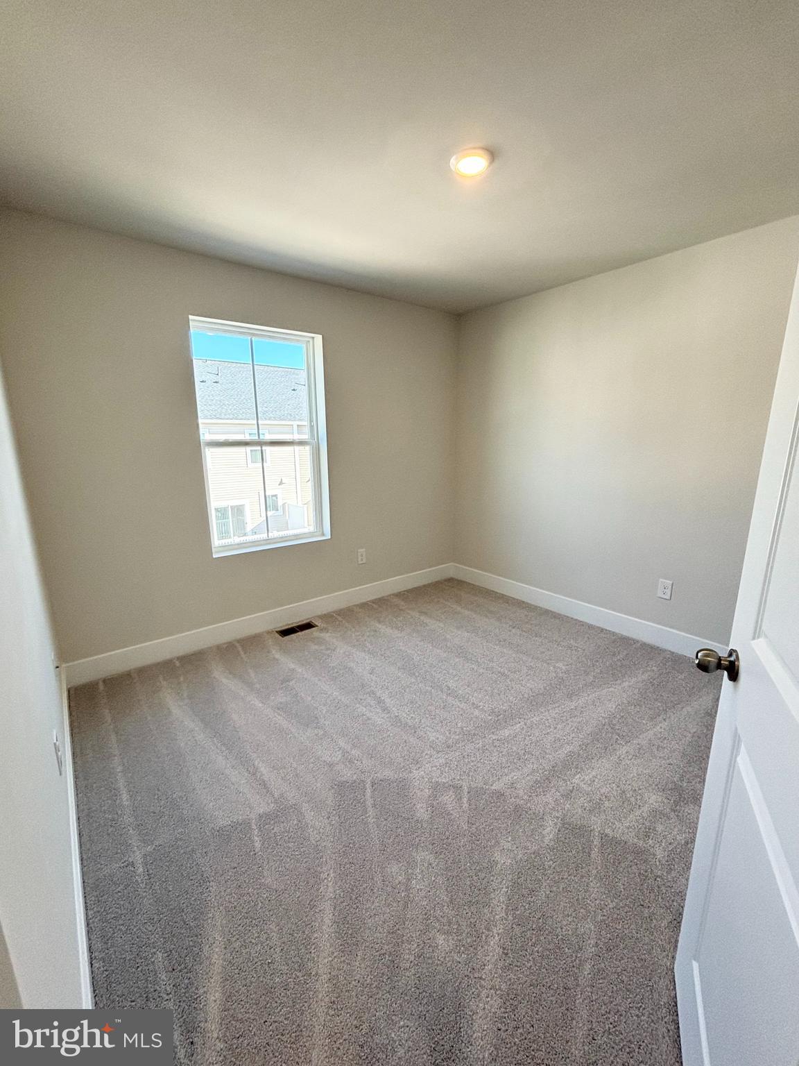 7234 Contee Road Laurel, MD 20707 - Photo 7 of 9 an empty room with windows