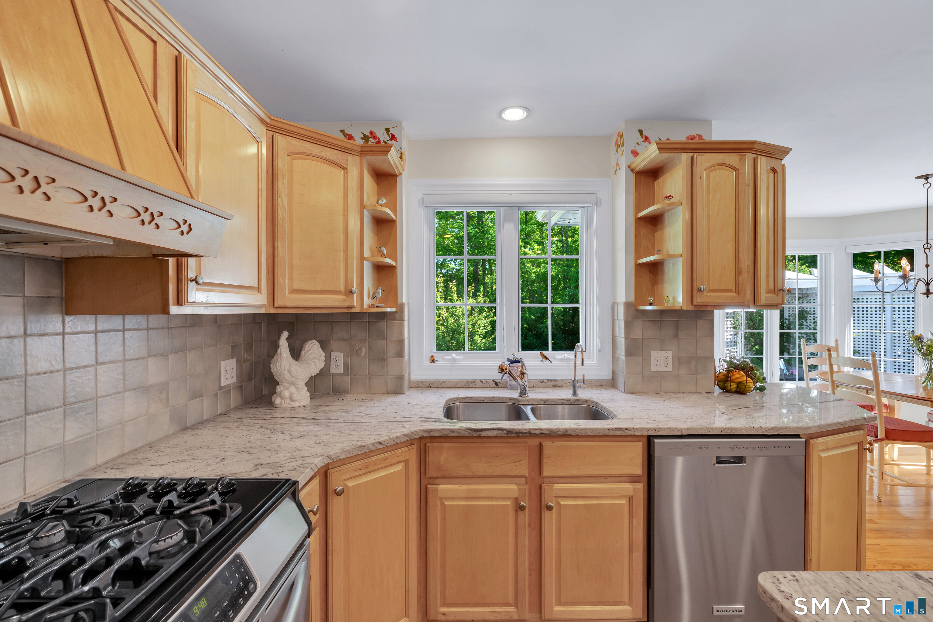 21 Stone Wall Road Salem, CT 06420 - Photo 16 of 38 a kitchen with stainless steel appliances a sink stove and cabinets