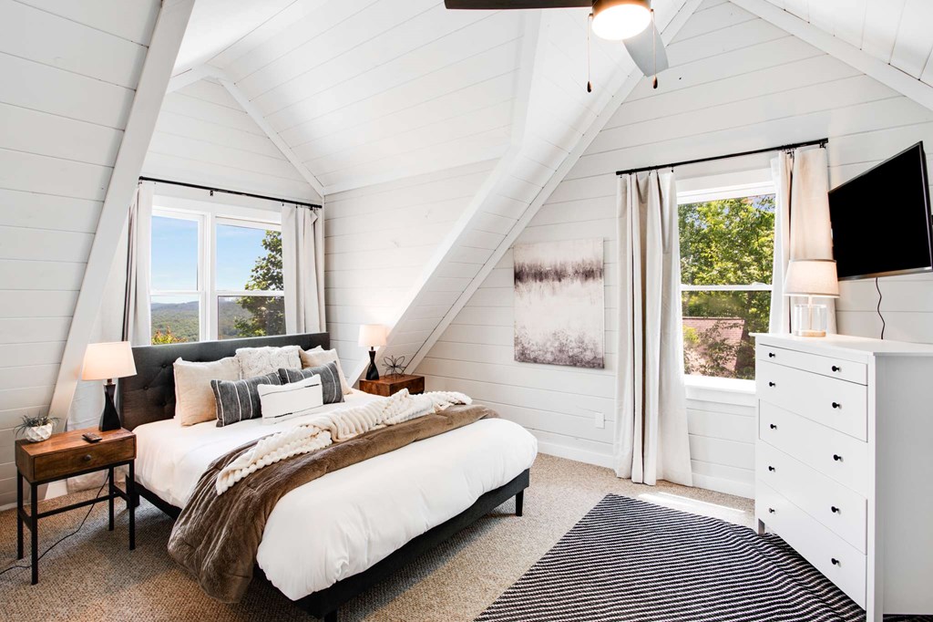 231 Sunrock Mountain Trail Blue Ridge, GA 30513 - Photo 37 of 61 a bedroom with a bed and a flat screen tv