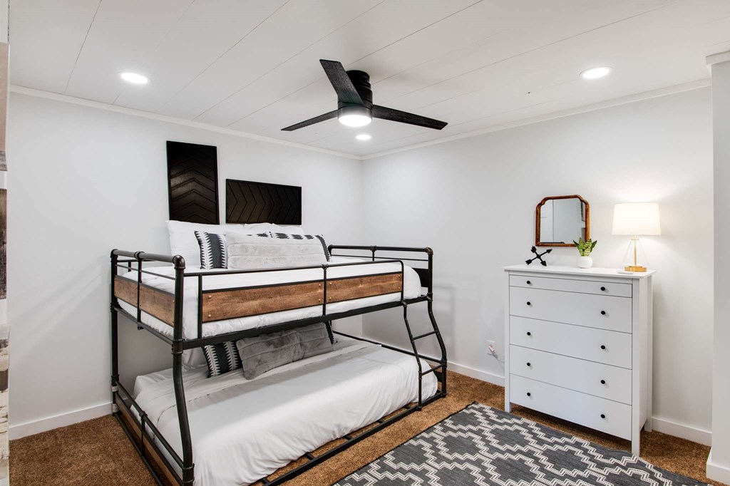 231 Sunrock Mountain Trail Blue Ridge, GA 30513 - Photo 44 of 61 a living room with furniture and a flat screen tv