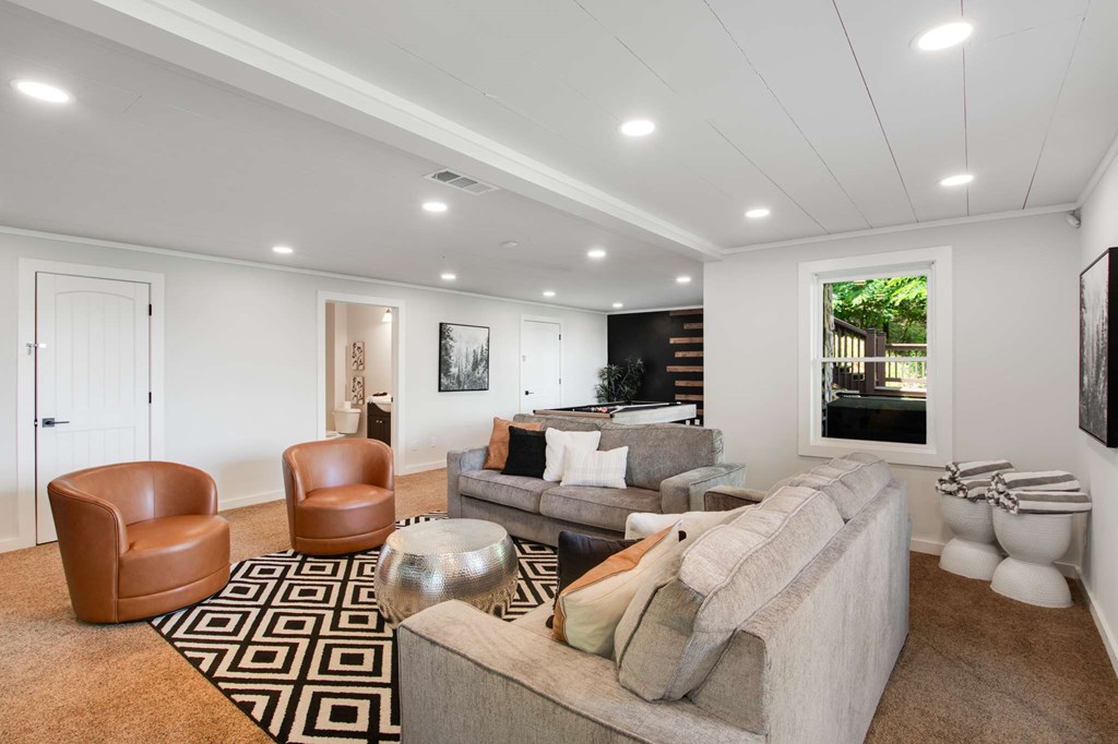 231 Sunrock Mountain Trail Blue Ridge, GA 30513 - Photo 47 of 61 a living room with furniture and a large window