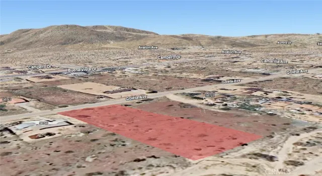 an aerial view of beach with residential space