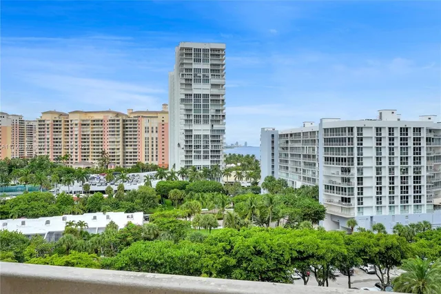 a utility room with cabinets dryer and washer
