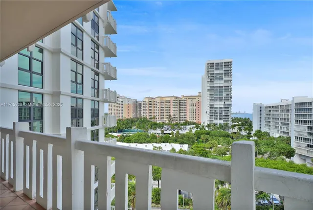 a view of a hallway with living room and furniture