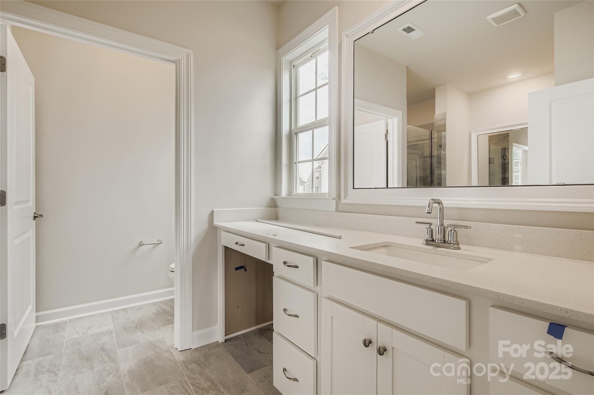 2238 Moon Crst Road Lancaster, SC 29720 - Photo 8 of 16 a bathroom with a sink and a mirror