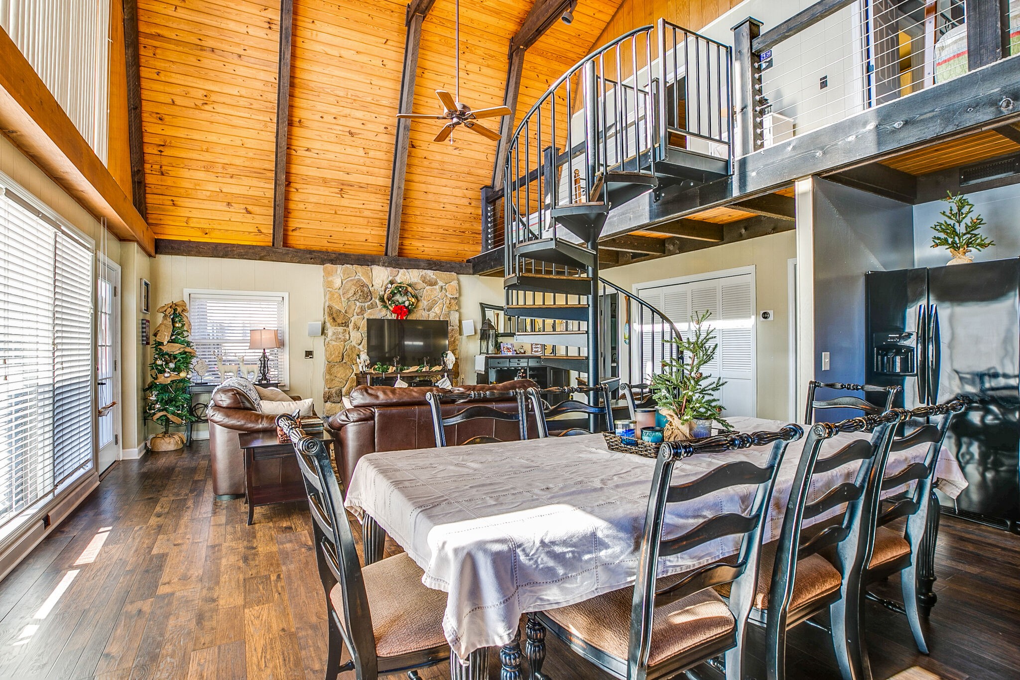 175 Holly Tree Drive Estill Springs, TN 37330 - Photo 15 of 38 a view of a patio with table and chairs and potted plants