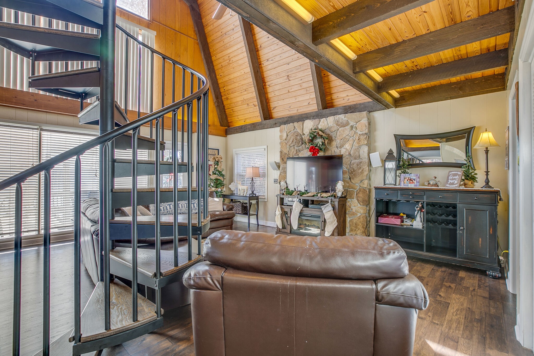 175 Holly Tree Drive Estill Springs, TN 37330 - Photo 20 of 38 a living room with furniture and a flat screen tv