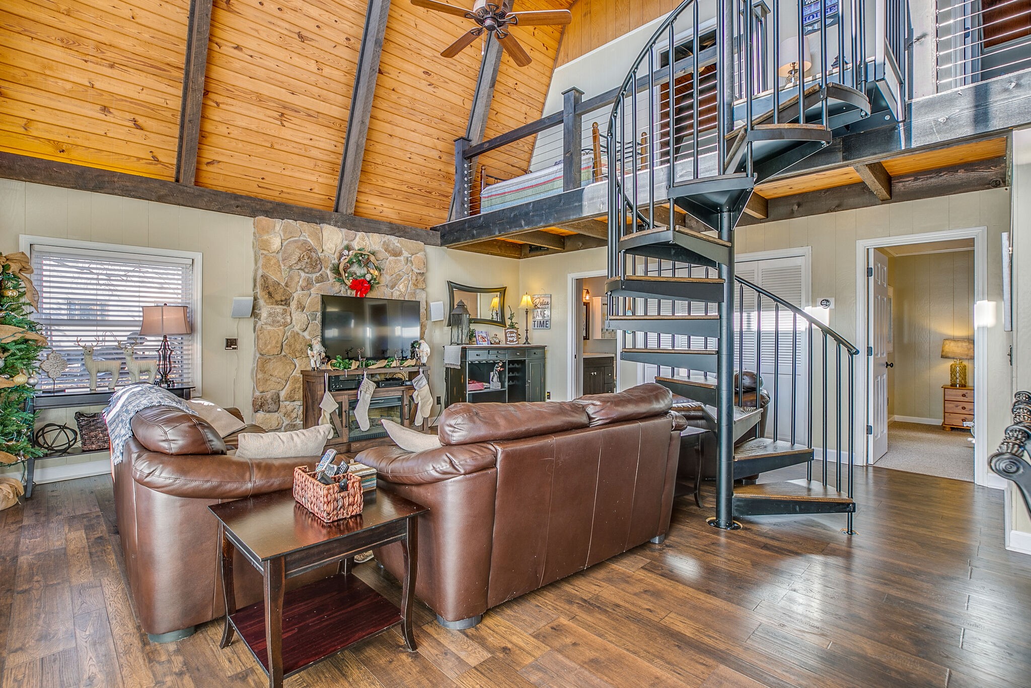 175 Holly Tree Drive Estill Springs, TN 37330 - Photo 23 of 38 a view of a patio with a table and chairs and potted plants