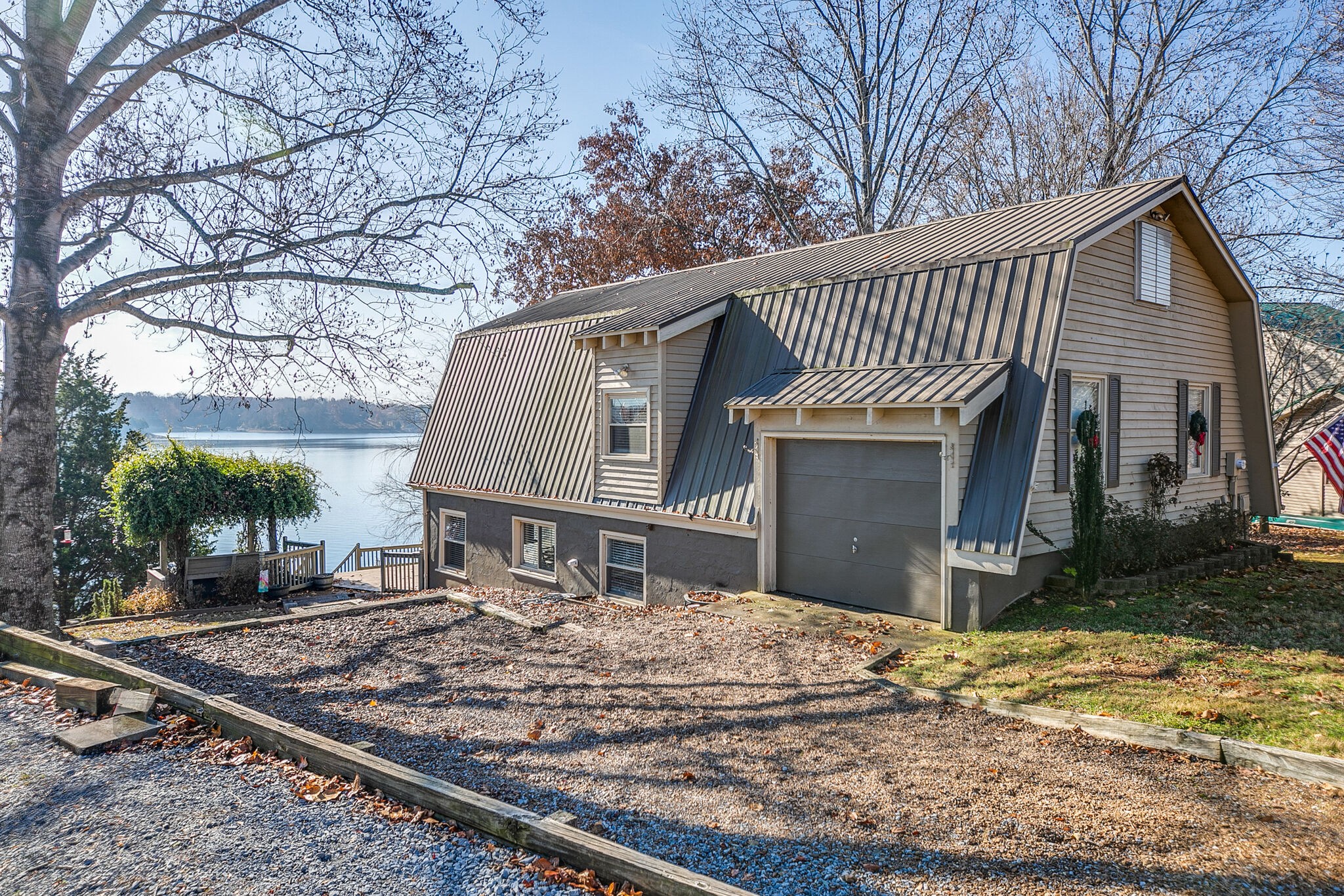 175 Holly Tree Drive Estill Springs, TN 37330 - Photo 8 of 38 a view of a house with a yard covered with snow in the background