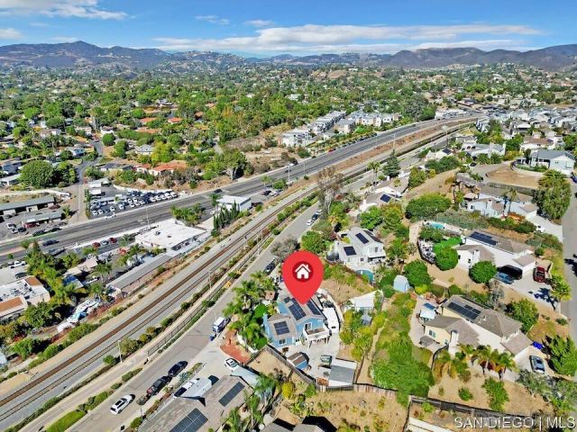 an aerial view of city and mountain view in city