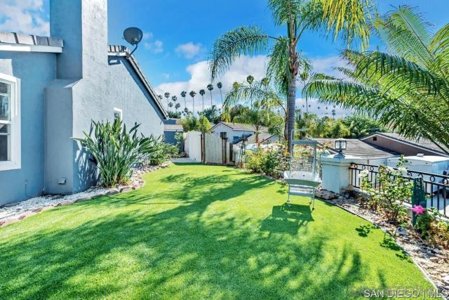 a garden view with a fountain