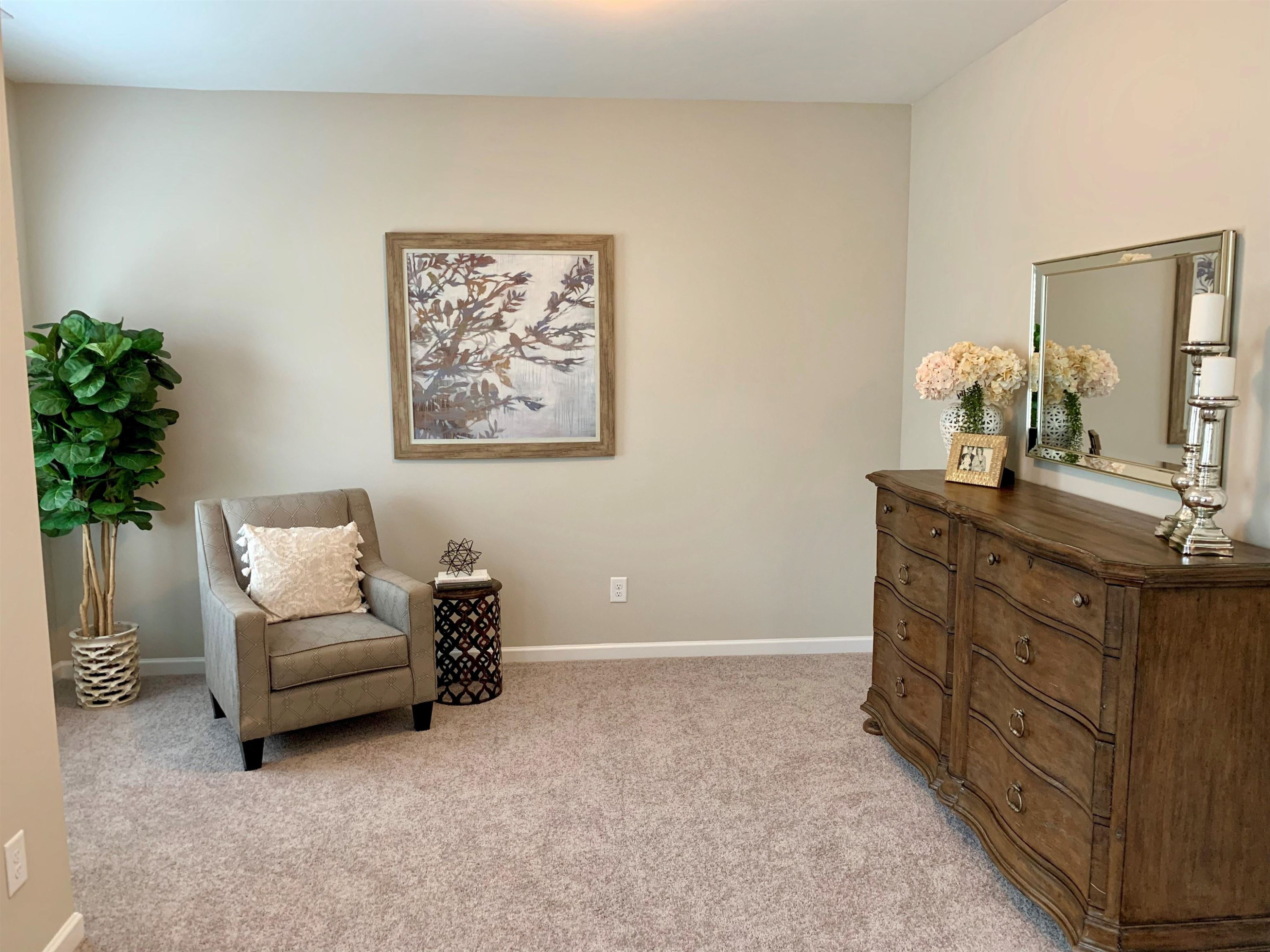 3901 Bluffwind Drive, Unit 129 Raleigh, NC 27603 - Photo 12 of 22 Primary Bedroom Sitting Room
