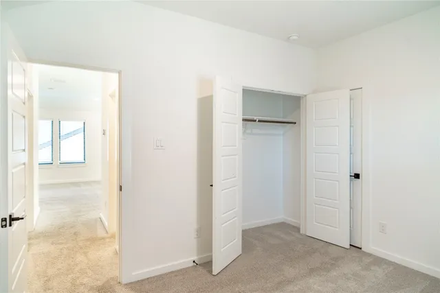 an empty room with closet