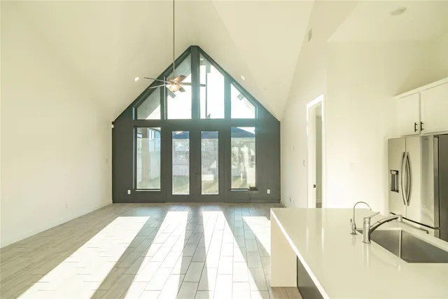 a view of a bathroom with sink and balcony