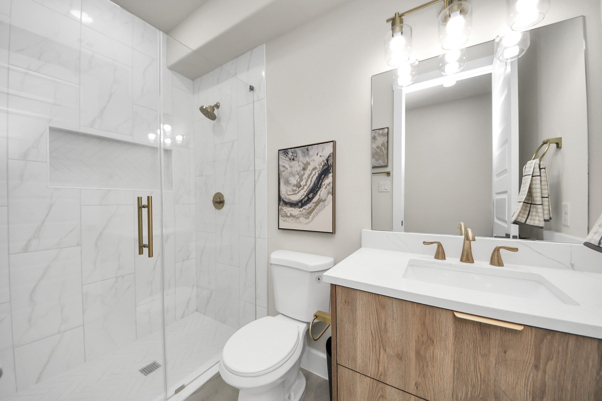 2014 Blodgett Street Houston, TX 77004 - Photo 9 of 49 a bathroom with a sink toilet and shower