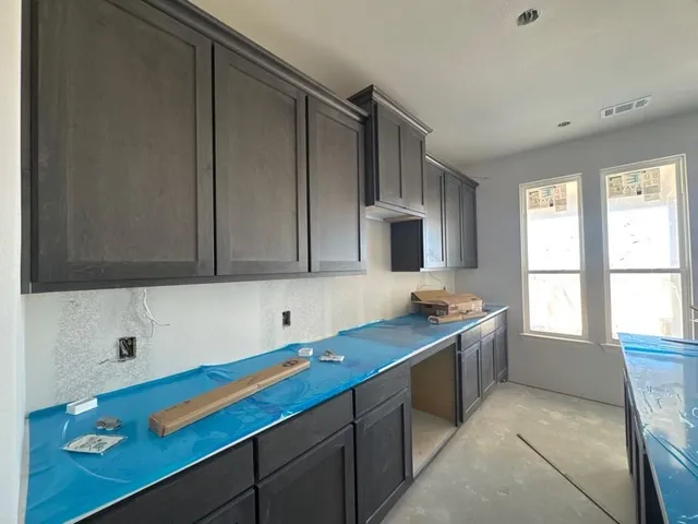 a room with storage and utility