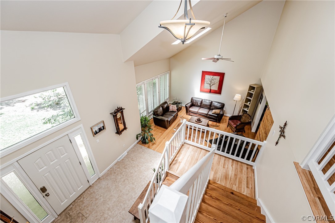 6022 Watch Harbour Road Midlothian, VA 23112 - Photo 4 of 50 a view of a room with furniture wooden floor and windows