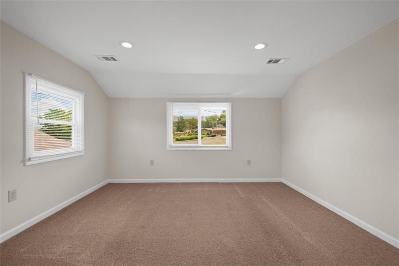 1122 Pittsburgh Road Valencia, PA 16059 - Photo 16 of 25 an empty room with a window