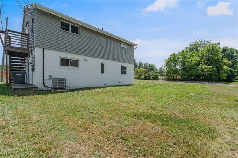 1122 Pittsburgh Road Valencia, PA 16059 - Photo 2 of 25 a house with a yard