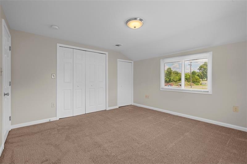 1122 Pittsburgh Road Valencia, PA 16059 - Photo 8 of 25 a view of an empty room with a window