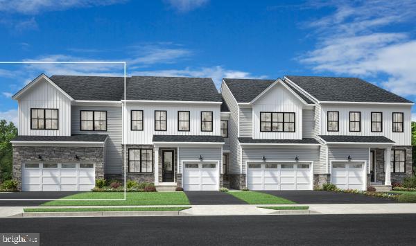 523 Anfield Road, Unit HOMESITE 195 Malvern, PA 19355 - Photo 2 of 6 a front view of a house with a garden