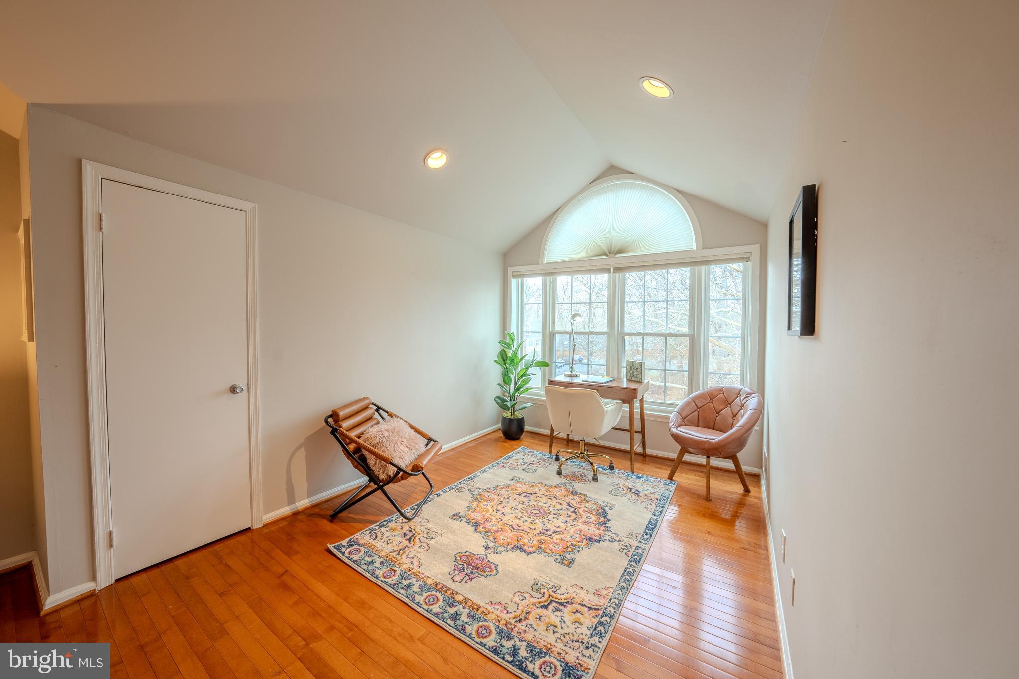 11168 Beaver Trail Court Reston, VA 20191 - Photo 23 of 42 a living room with furniture and a window