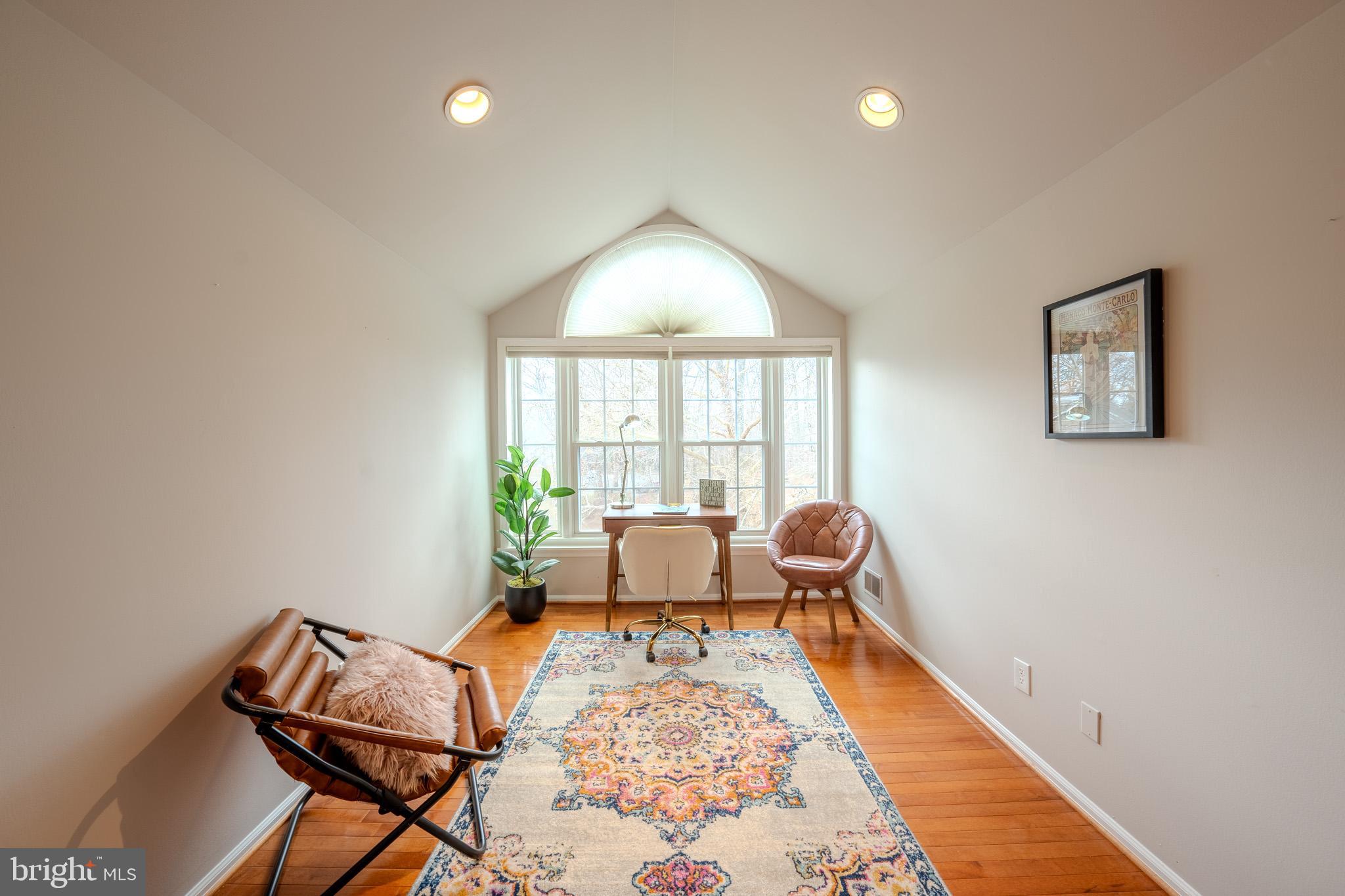 11168 Beaver Trail Court Reston, VA 20191 - Photo 28 of 42 a living room with furniture and a window