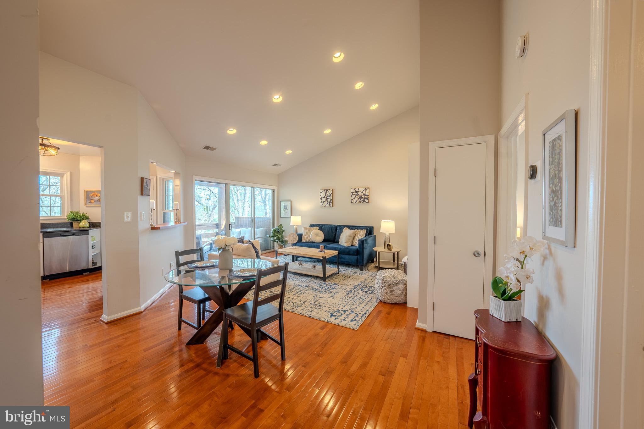 11168 Beaver Trail Court Reston, VA 20191 - Photo 3 of 42 a view of a dining room with furniture and wooden floor