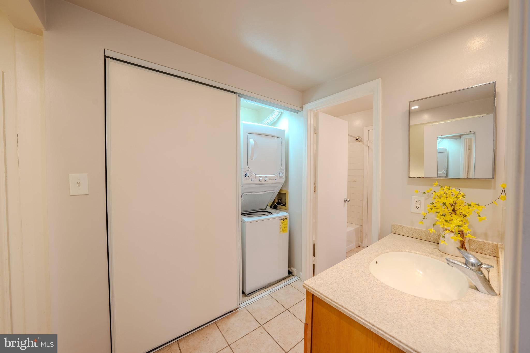 11168 Beaver Trail Court Reston, VA 20191 - Photo 32 of 42 a bathroom with a sink and mirror