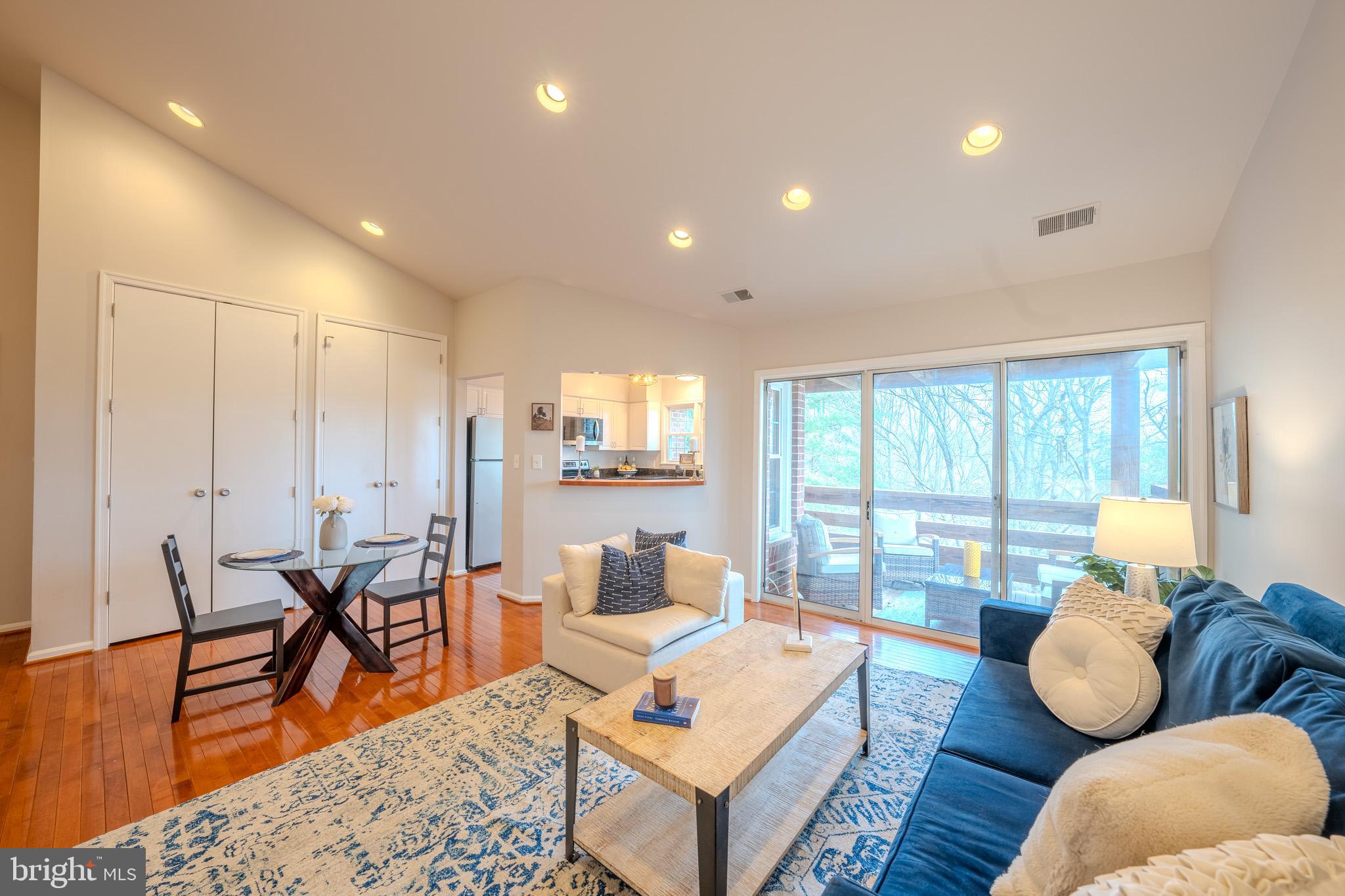 11168 Beaver Trail Court Reston, VA 20191 - Photo 10 of 42 a living room with furniture and a large window