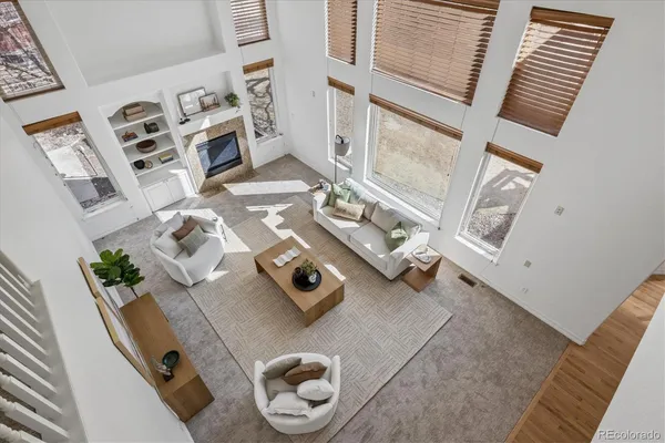 a living room with furniture and a rug
