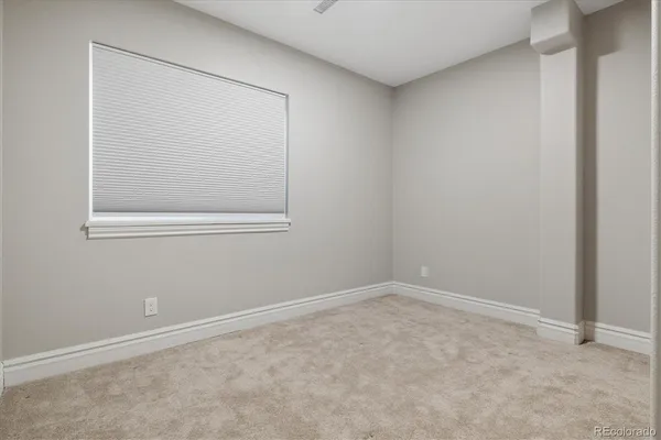 an empty room with a window