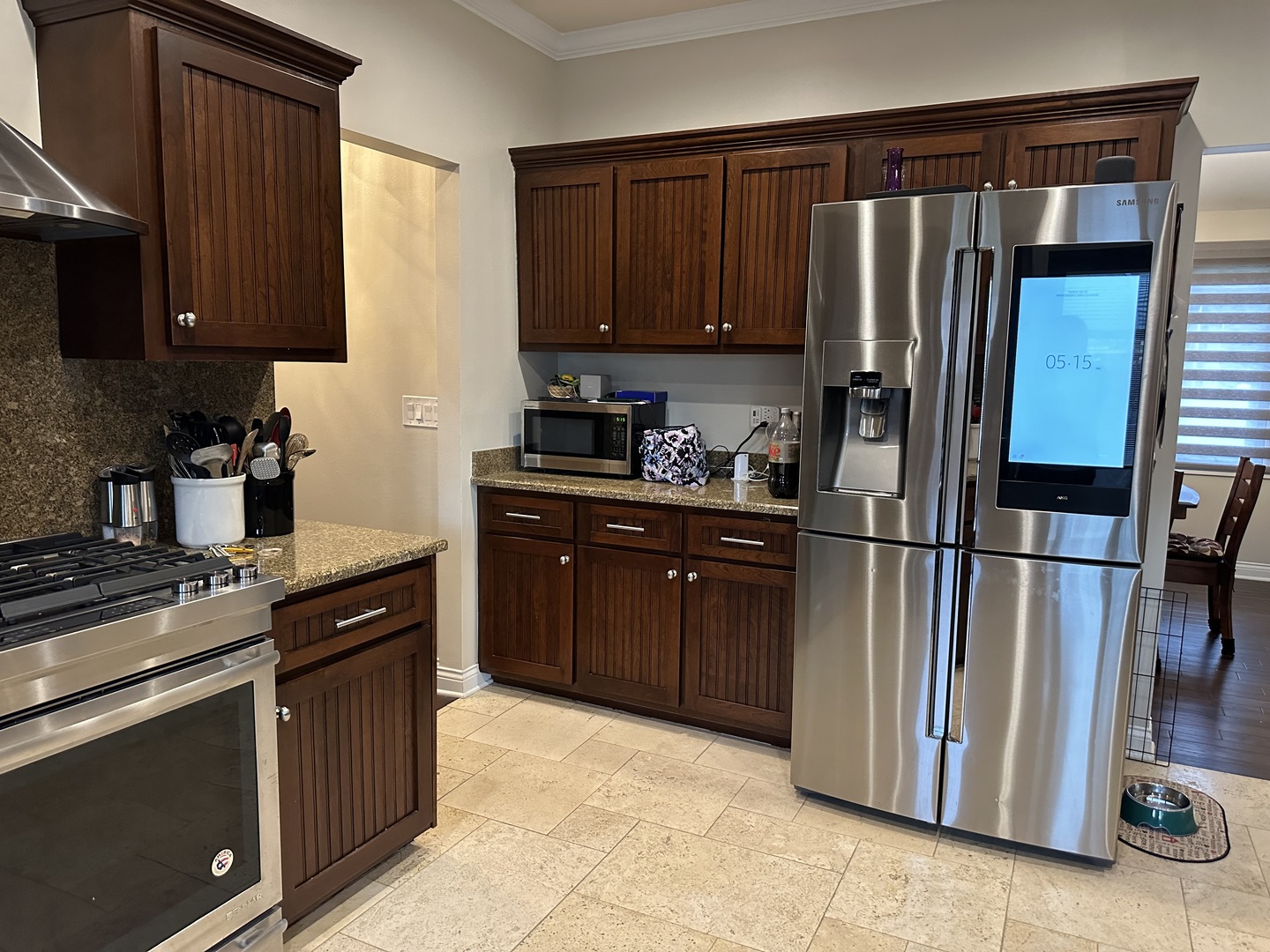 302 North Westgate Road Mount Prospect, IL 60056 - Photo 3 of 26 a kitchen with stainless steel appliances granite countertop a refrigerator stove and sink