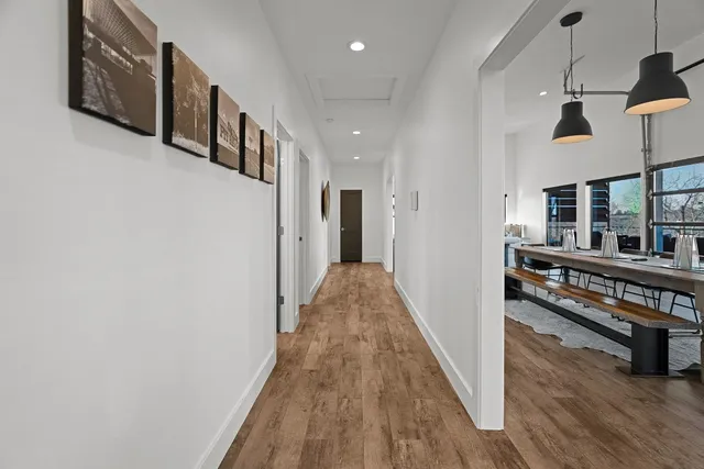 a view of a livingroom with furniture and wooden floor