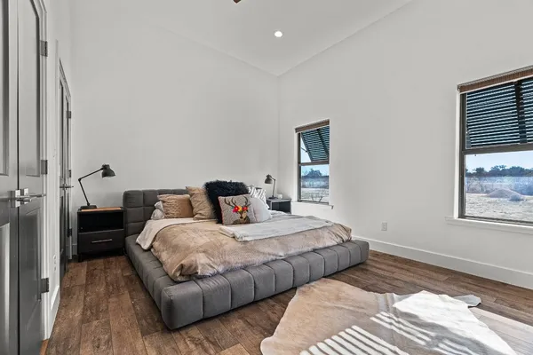 a bedroom with a bed and furniture