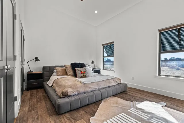 a bedroom with a bed and furniture