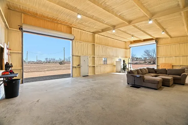 a view of a yard with an outdoor space