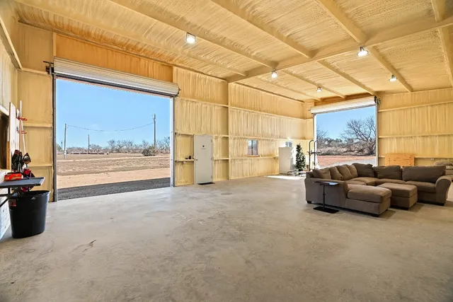 a view of a yard with an outdoor space