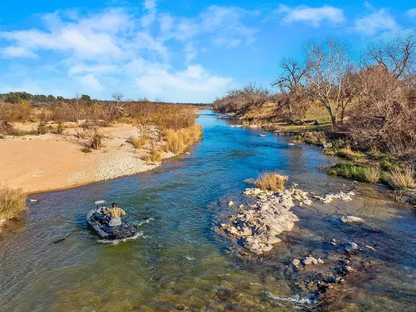 a sign on the side of a street