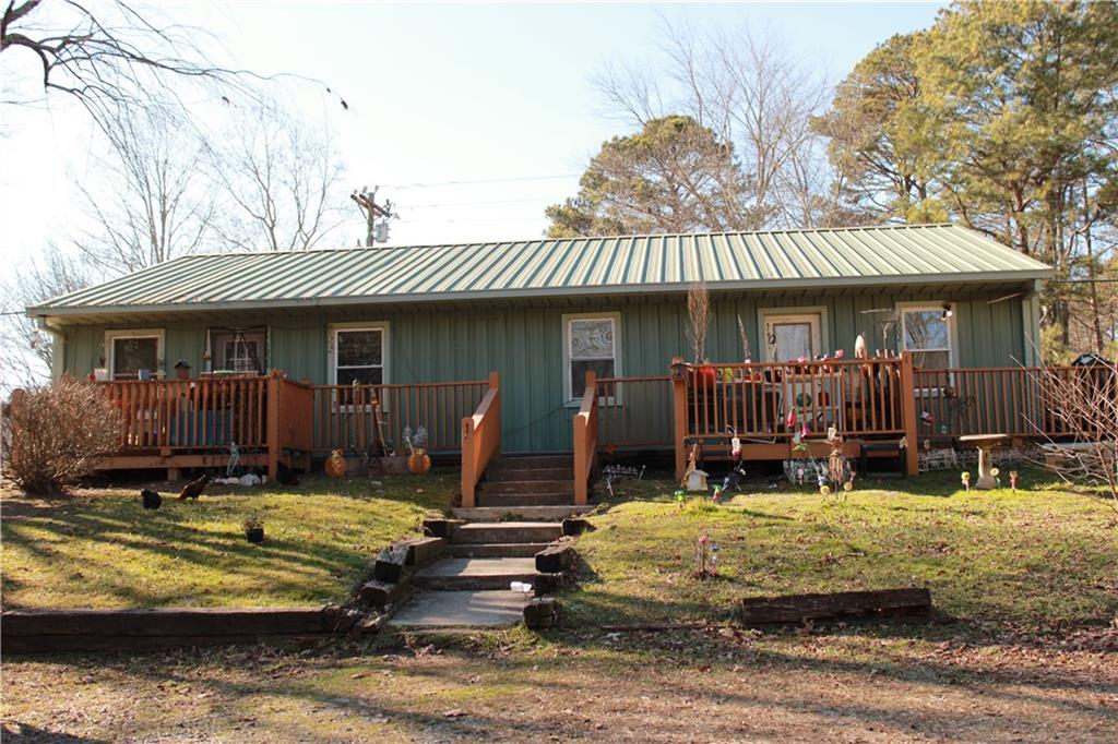 5002 Yukon Road Ellijay, GA 30536 - Photo 1 of 1 a view of a house with swimming pool
