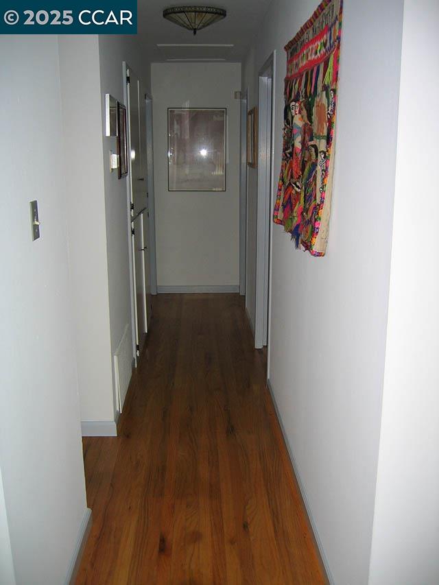 362 Summit Court Pinole, CA 94564 - Photo 22 of 57 a view of a hallway with wooden floor