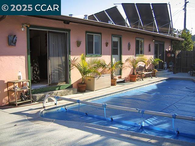 362 Summit Court Pinole, CA 94564 - Photo 30 of 57 a view of backyard with wheel chair potted plants and wooden floor
