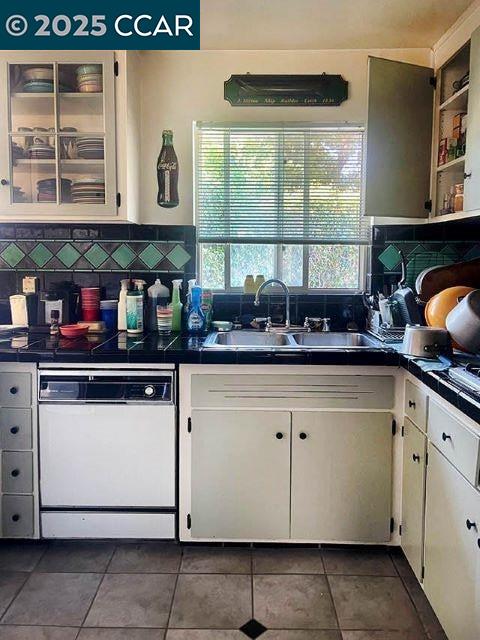 362 Summit Court Pinole, CA 94564 - Photo 9 of 57 a kitchen with a cabinets and window
