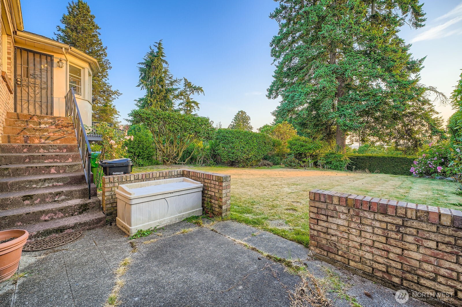 3041 52nd Avenue Southwest Seattle, WA 98116 - Photo 25 of 31 a view of a terrace with yard and green space