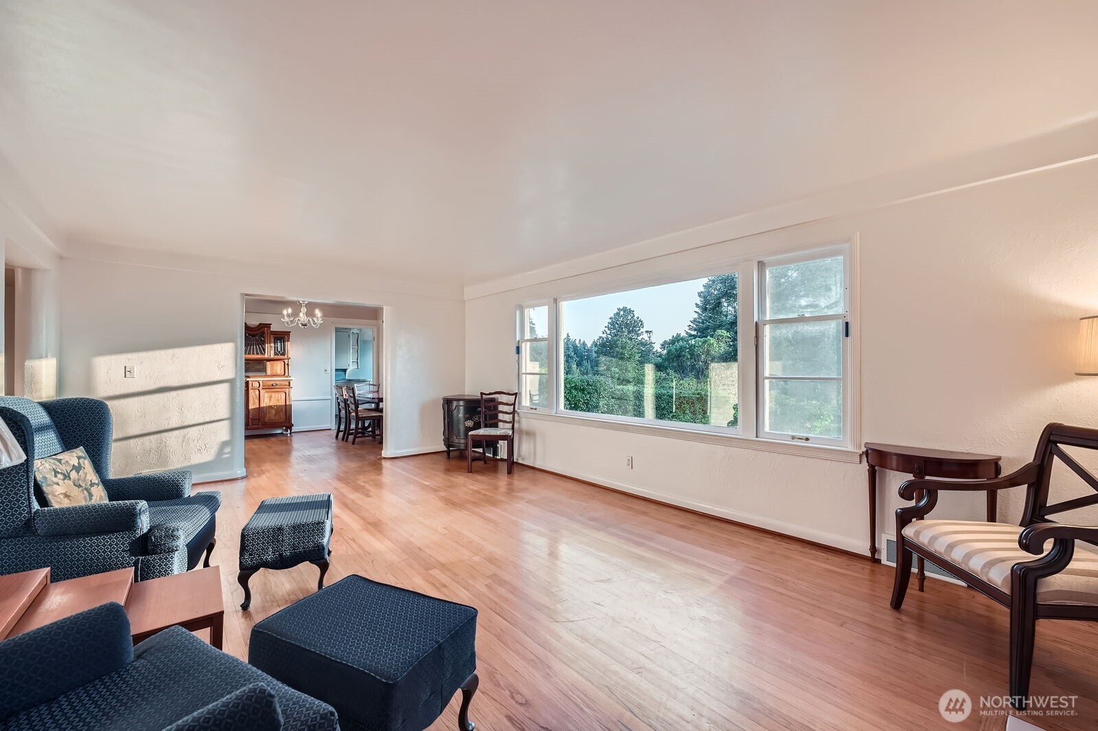 3041 52nd Avenue Southwest Seattle, WA 98116 - Photo 6 of 31 a living room with furniture and a wooden floor