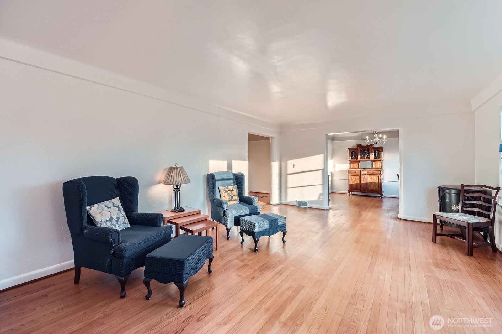 3041 52nd Avenue Southwest Seattle, WA 98116 - Photo 7 of 31 a living room with furniture and a wooden floor