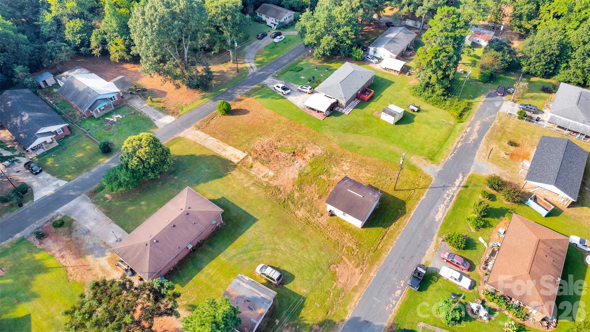 44432 Richardson Road Norwood, NC 28128 - Photo 2 of 8 an aerial view of a house with a swimming pool