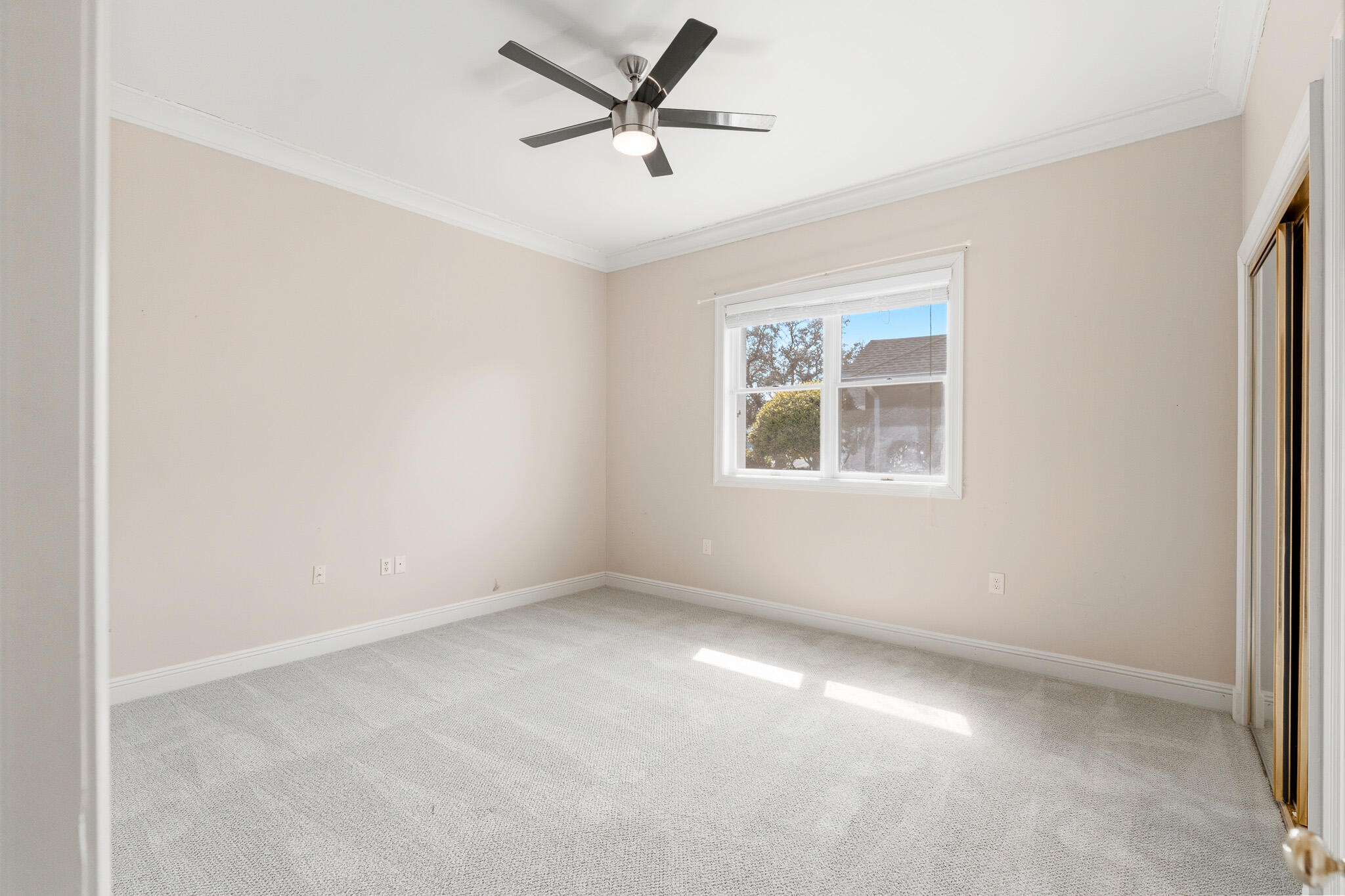8 Weekewachee Circle Destin, FL 32541 - Photo 38 of 55 an empty room with a window and a fan